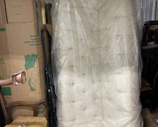 One of two white sofas.