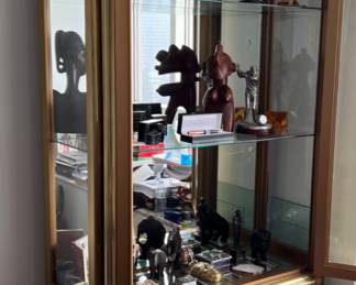 Brass curio cabinet.