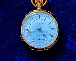 18k gold Elgin pocket watch.