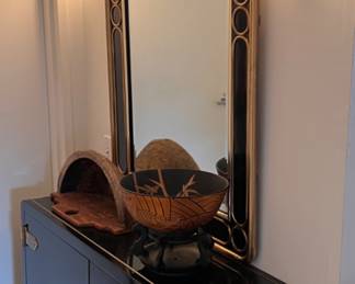 Black lacquered Chinese style cabinet and mirror.