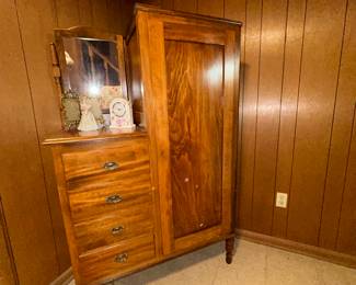 Antique wardrobe with drawers and mirror