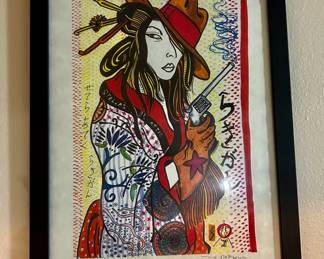 “Lucky Gun Kabuki” by Guru of Jap Pop, Brooklyn, New York Artist Zane Fix from 2007 with black finish glass frame https://www.zanefix.com/ 
Japanese Ukiyo-e woodblock limited edition print portrait with mid century pop art using paint, ink, pen and wax pencil on rice paper, hand signed by the artist
Size: 11” H x 17” W and 12.25” H x 18.25” W with black finish glass frame
Translation from Japanese: Lucky Gun on right, Stella’s A Attic on left from Zane’s Geisha’s on Rice Paper collection and East meets West modern interpretations of traditional wood block print portraits
