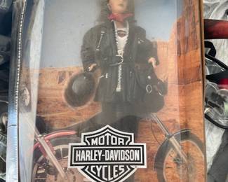 harley barbie dolls several