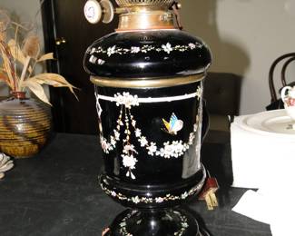 Antique gas lamp that has since been updated to electricity.