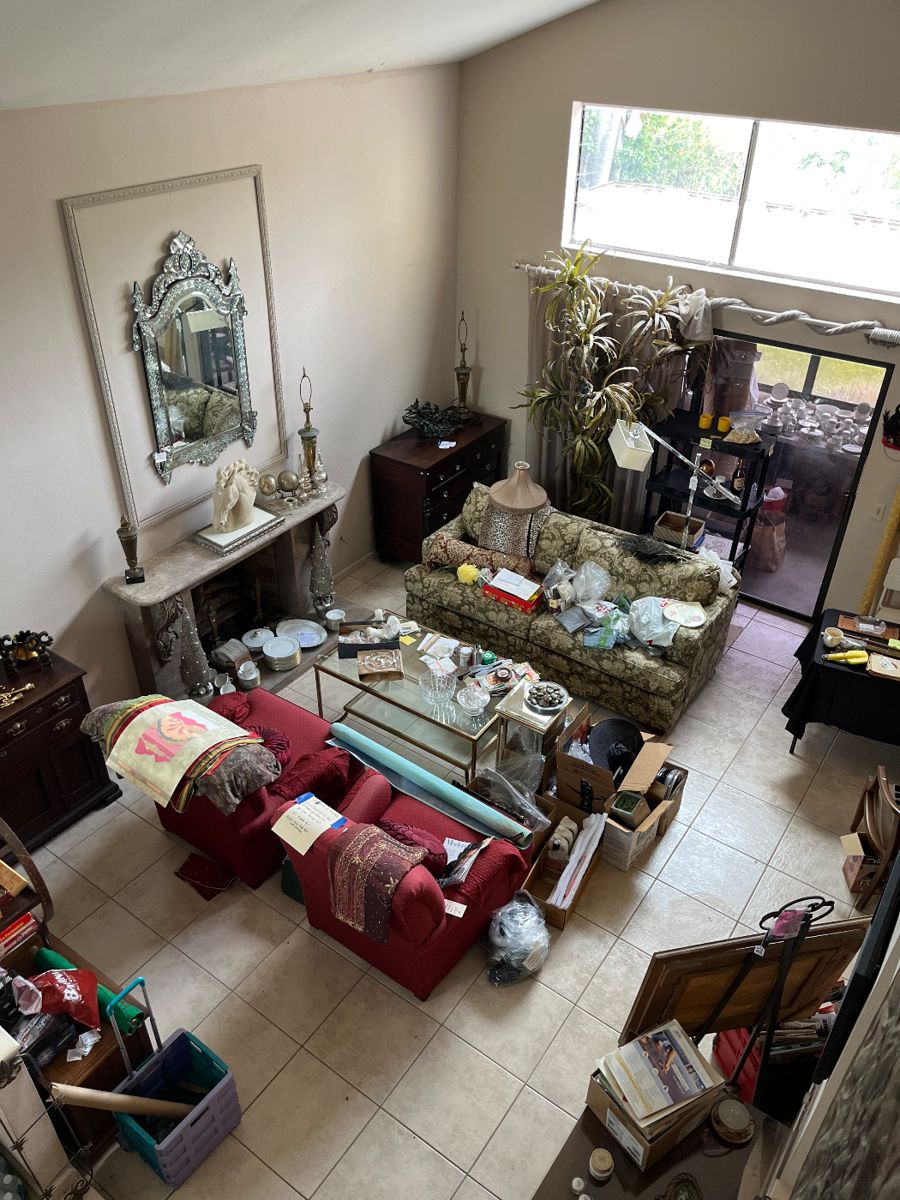 Currey & Co glass gilt coffee table, (2) custom comfy Ethan Allen Chairs, Stiffel brass lamps, antique chests, custom made faux plant & much more!