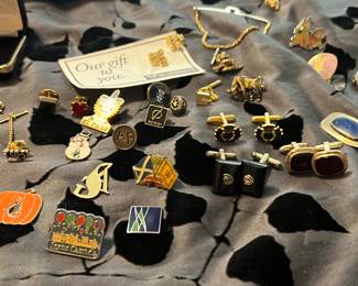 Lots more cufflinks, pins and fancy money clips!
