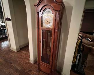 Wonderful and beautiful large grandfather clock. Right by the entrance for easy removal