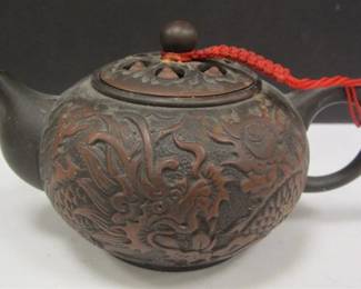 AS IS YIXING TEAPOT WITH LOTUS SEED LID.  AS IS, HAS CHIP ON INSIDE RIM OF LID