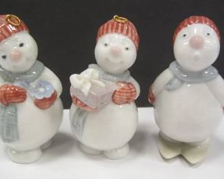 THREE NAO PORCELAIN SNOWMEN ORNAMENTS.  ONE MISSING THE HANGER RING