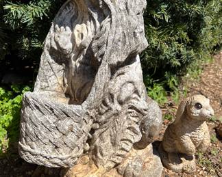 Cement dog and bunny