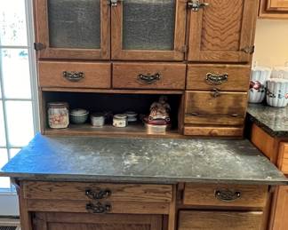 Vintage Hoosier cabinet with metal top