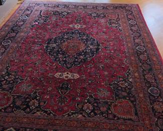 9'4" x 12'8". Wool area rug 