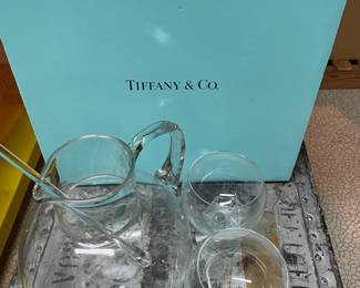 Tiffany & co. Pitcher/stirrer and two glasses.