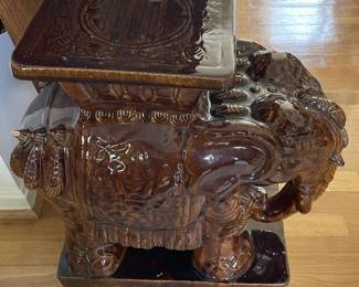 Brown ceramic elephant planter.