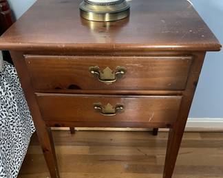End table with two drawers.