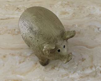 Selection of pig figurines.