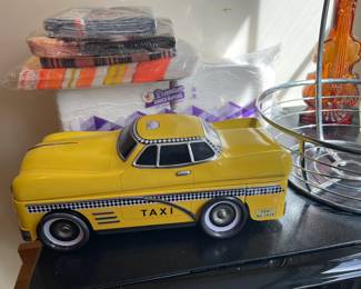 Taxi tin canister.
