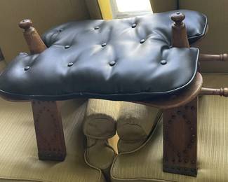 Vintage camel saddle stool.