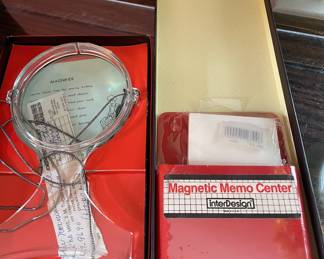 Large magnifying glass and magnetic memo center.