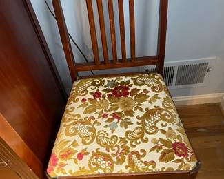 Small upholstered chair.