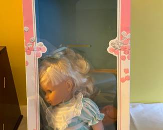 Olivia doll in box.