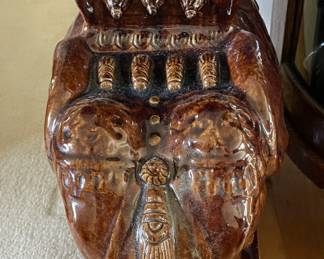 Brown ceramic elephant planter.