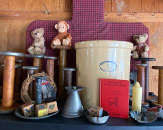 large Marshall pottery crock and old wooden spools
