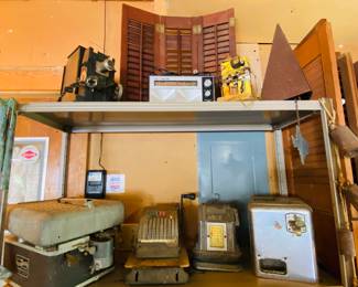 old movie projector, old mechanical coin separator, fun steam punkesque style contraptions Wiley Coyote would own