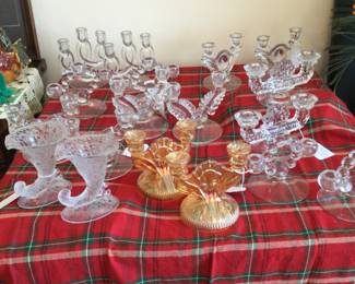 Collection of beautiful matched sets of candlestick holders. 