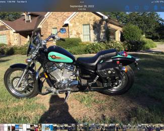 Beautiful Retro Green & Black 1998 Honda Shadow with 8,488 miles. Garage kept and well maintained.   Extras include Leather saddlebags, Crash bars and Large Windshield.   VERY CLEAN