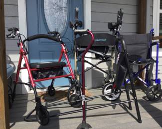 Misc.,  medical equipment includes lightweight transport wheelchair and red push walker with built in eat. Also shown is a brand new, never used upright walker. 