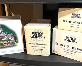 Dickens village collectibles in boxes