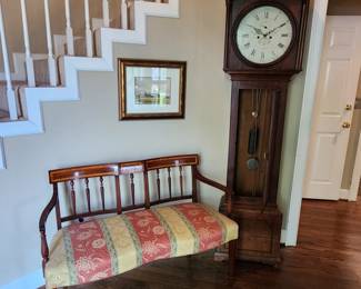 Vintage Settee with Inlay Detailing and Antique Grandfather Clock