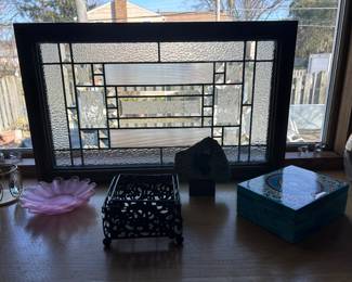 Framed glass hanging panel