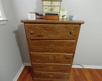 Ornately carved chest of drawers