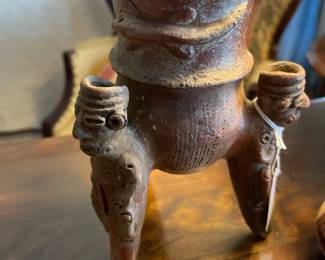 Pre Colombian tripod vessel with rattle legs