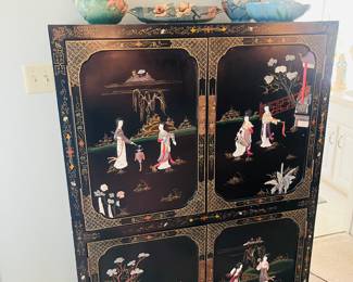 Vintage Asian black lacquer with mother of pearl accents armoire