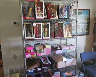 one of the two racks full of Barbies