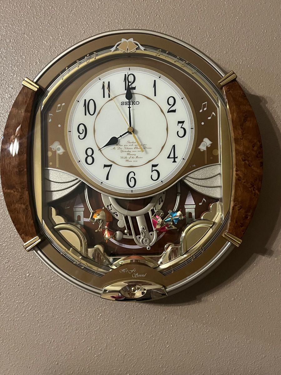 Seiko - Golden Puppets Melodies in Motion Clock