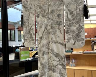Spectacular silk brocade wedding kimono with tasseled display rod