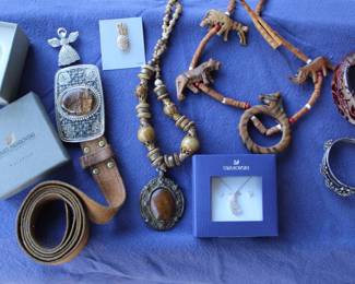 Various items of costume jewelry. Including