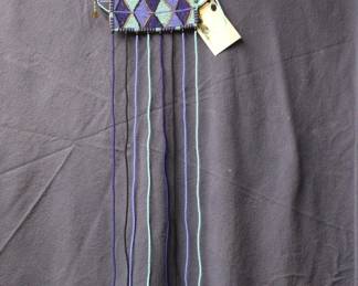 Beaded collar approximately 36 inches long