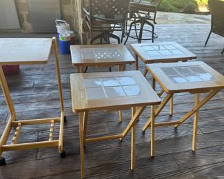 Awesome set of TV tables with stand and it’s on wheels as well!