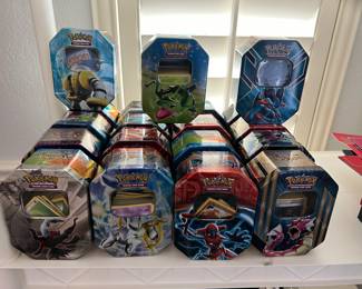 Lots of Pokémon cards in their tins