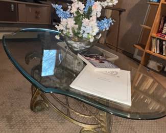 Oval glass topped coffee table