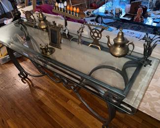 Glass topped table, metal base