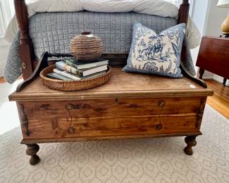 Custom down pillows, amazing book collection, stark carpet...