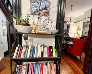 Bakers rack loaded with awesome cookbooks