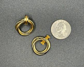 J22 - $300. Pair of 14 kt gold earrings. 