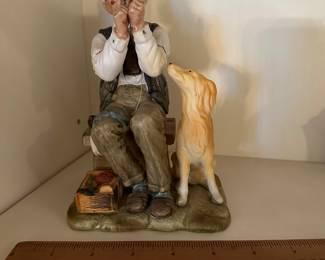 C43 - $8 Porcelain Figure with Dog. 